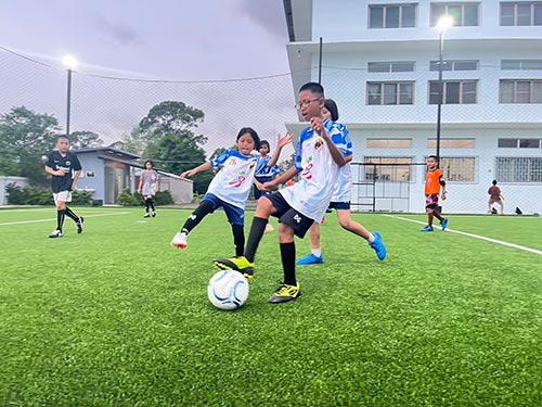 Playing football Football